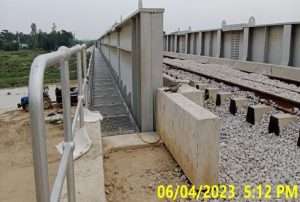 Bridge walkway grating and railing work is in progress at Bridge No.155Canopy